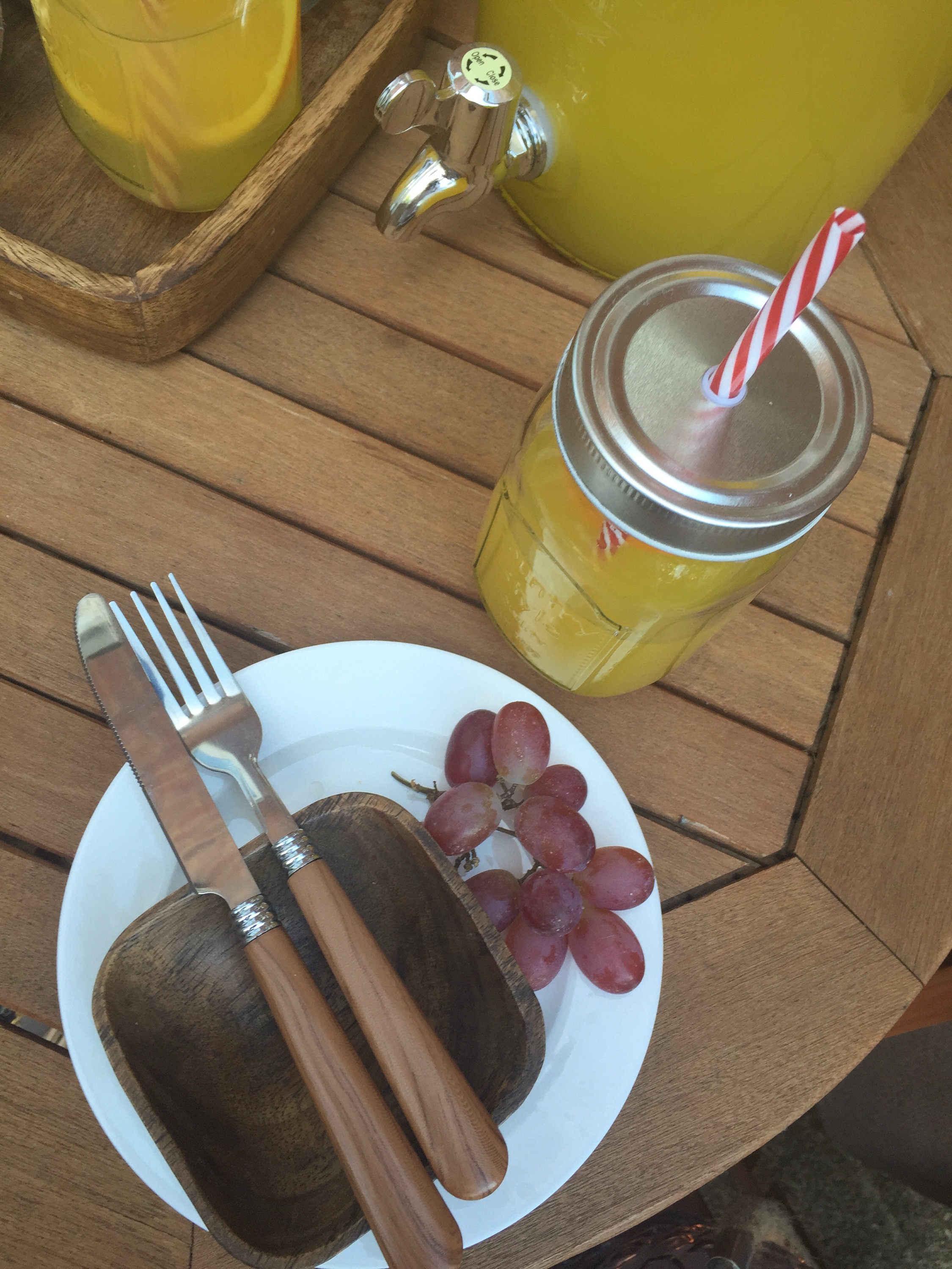 rustic outdoor dining with mason jar glasses via Always a Blue Sky Girl blog